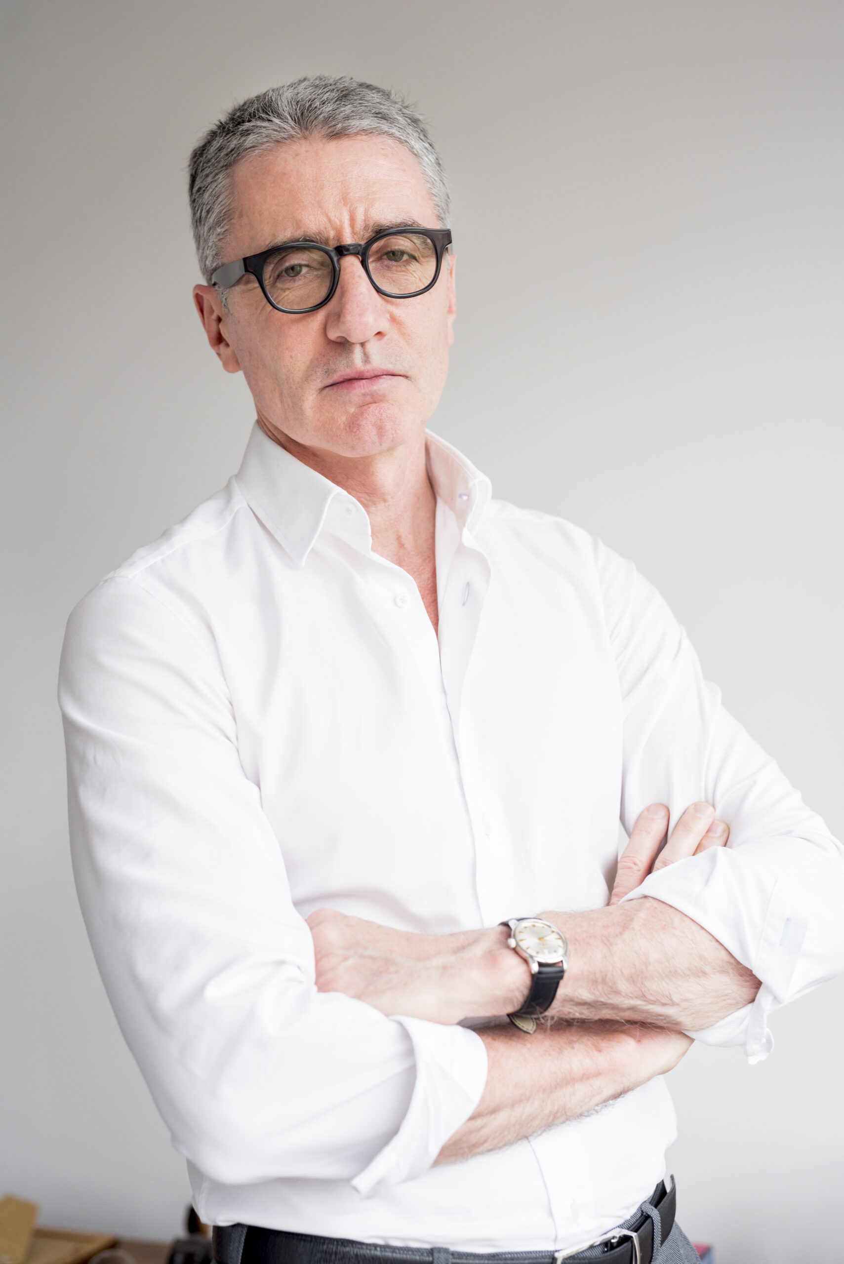 elderly businessman posing